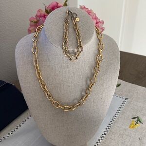 Gold chain-link necklace and matching bracelet by Stella and Dot.